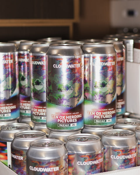 Multiple cans of Cloudwater craft beer, pale ale 'Ten Ox Herding Pictures' arranged on top of each other