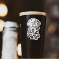 A pint glass with a white 'CLOUDWATER' cartoon logo. The glass is filled with dark, creamy low-alcohol stout, FRESKA. Our first AF stout is topped with a foamy head