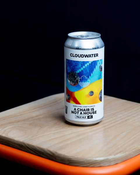 A can of A Chair Is Not A House pale ale by Cloudwater Brew Co, sat on a wooden surface with a black background