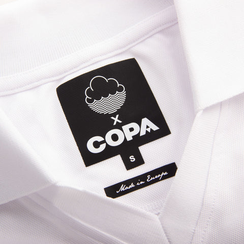 Close-up of inside collar label on Back of White Cloudwater Brew x COPA Retro Football Shirt sports jersey.