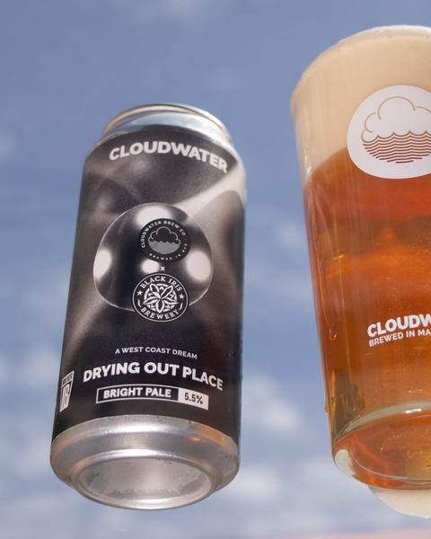 A crisp and clear pint of Drying Out Place West Coast Pale ale floats on a beautiful blue sky